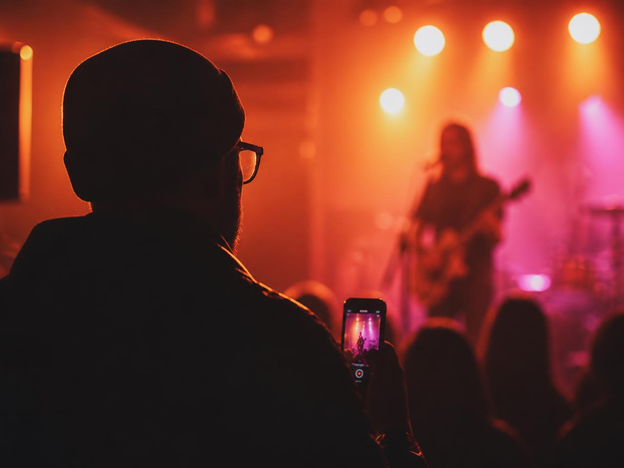 Scout filming a live performance